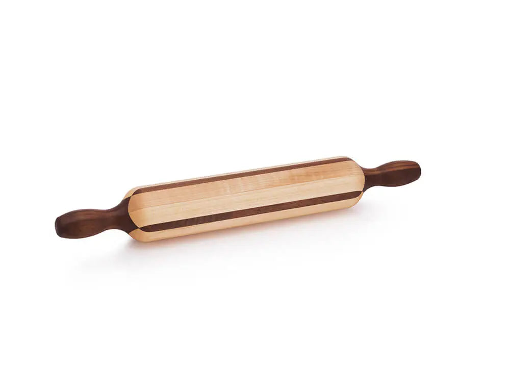 A white maple rolling pin with a walnut accent, featuring handles on both ends. The rolling pin has a light, natural maple color with a dark walnut strip running through the center, viewed from a top angle