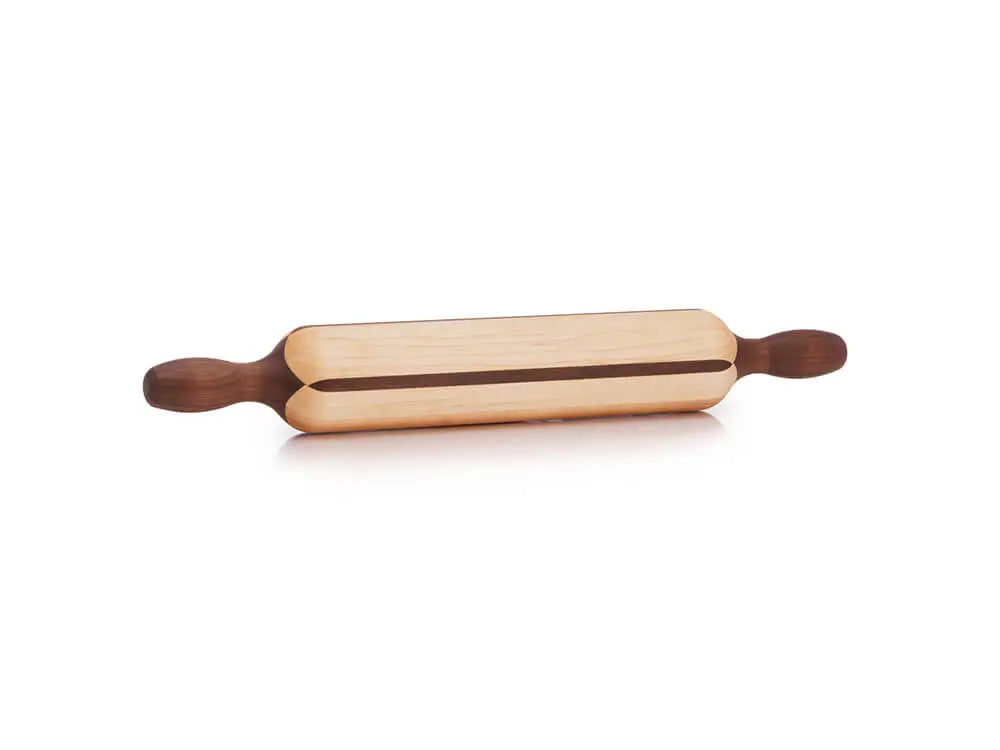 A white maple rolling pin with a walnut accent, featuring handles on both ends. The pin has a light, natural maple color with a dark walnut strip running through the center