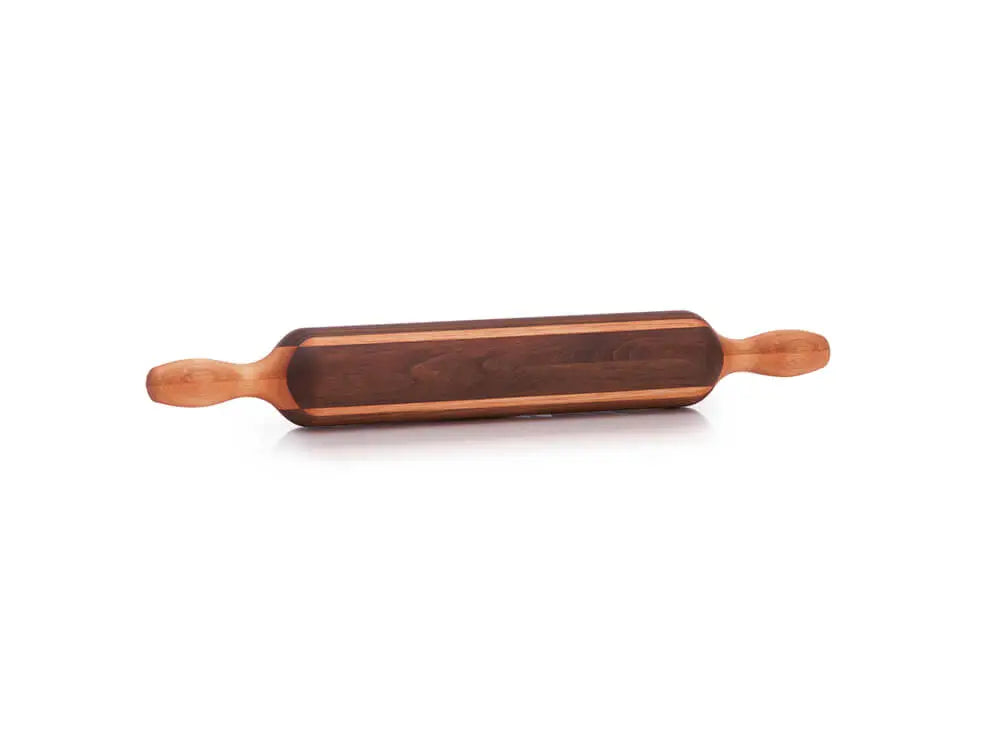 Boston Rolling Pin made of black walnut with a red grandis accent, viewed from the front. The rolling pin is 18 inches long, with a 2 ½ inch diameter, featuring handles on both ends