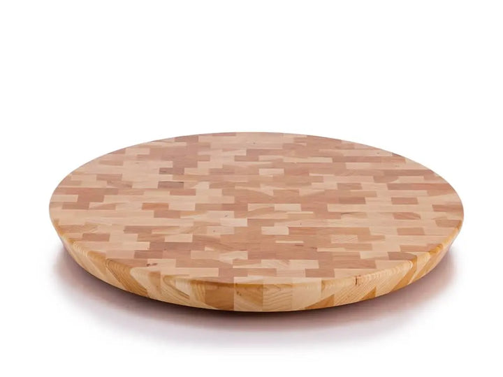 Top view of a round end-grain lazy susan with a light brown geometric mosaic pattern in various shades of hickory wood, on a white background