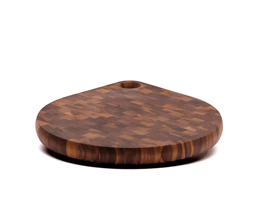 Front view of a black walnut end-grain charcuterie board board with a checkered pattern of various wood tones, featuring a smooth finish, against a white background