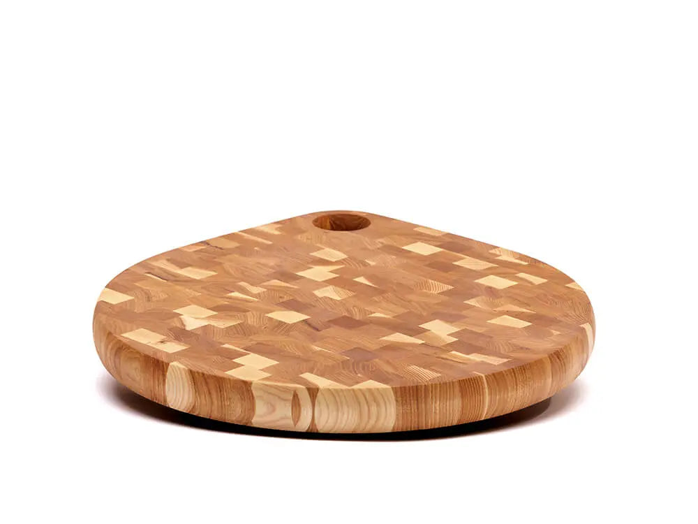 Front view of an end-grain charcuterie board board with a checkered pattern of various wood tones, featuring a smooth finish, against a white background