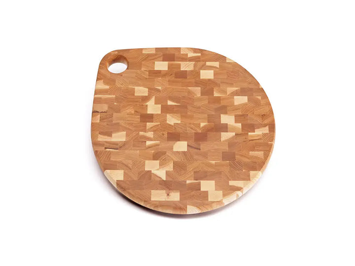 Top view of an end-grain charcuterie board with a checkered pattern of various wood tones, featuring a smooth finish, against a white background